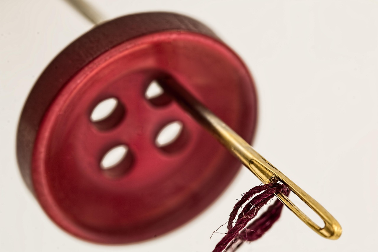 Comment coudre un bouton correctement ?